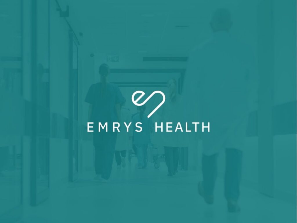 Emrys health green blue image with white Emrys Health logo in the middle healthcare setting in the background.