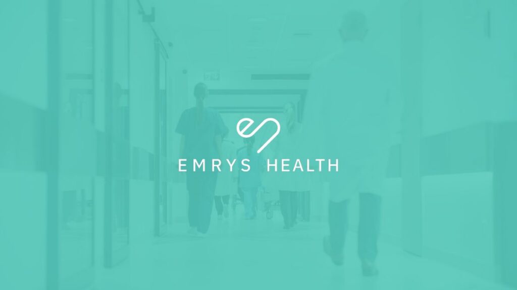 Emrys health light green image with white Emrys Health logo in the middle healthcare setting in the background, rectangle dimensions